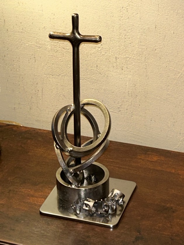 Crowns at the foot of the cross