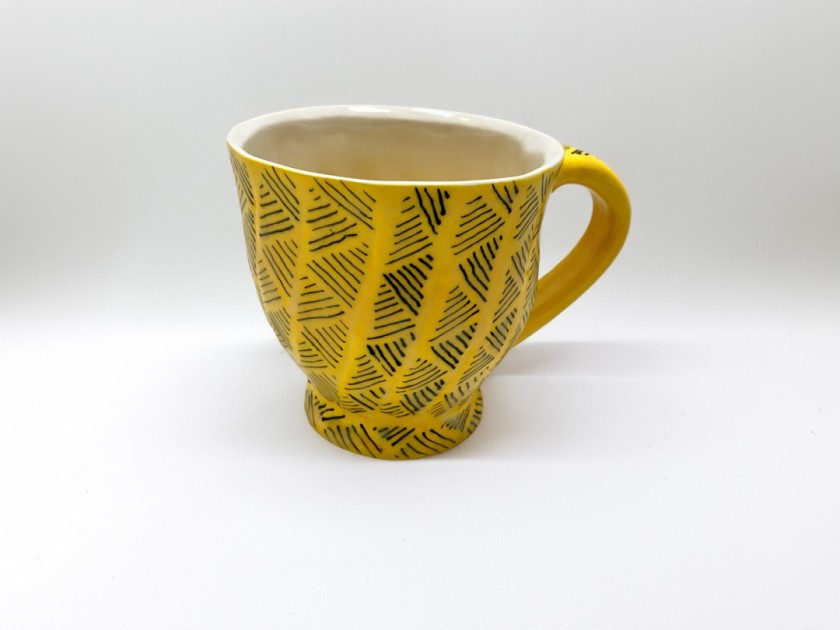 Yellow mug with black lines